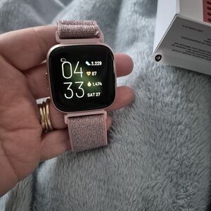 Fitbit Smartwatch with Pink Fabric Strap